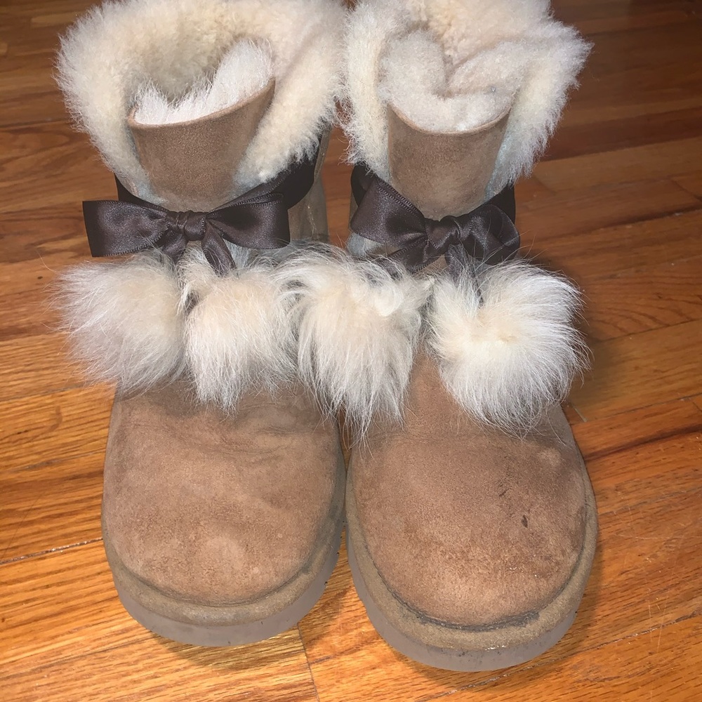 Ugg fur boots with bow tie ball decoration